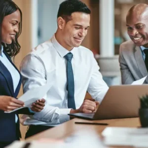 A group of professionals discussing business plans and investment opportunities, symbolising entrepreneurship and investment.