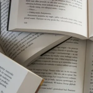 Open books with text, symbolising the study of English literature and literary analysis.