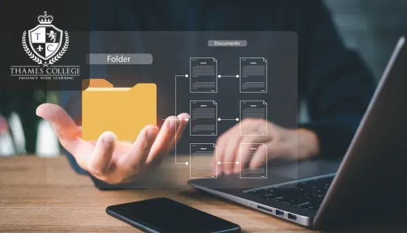 Person using a laptop with a digital overlay showing a folder and interconnected document icons, representing document control.