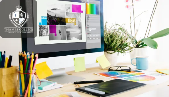A modern graphic designer’s workspace with a desktop monitor displaying a collage design project and colour palette tools, surrounded by creative supplies.