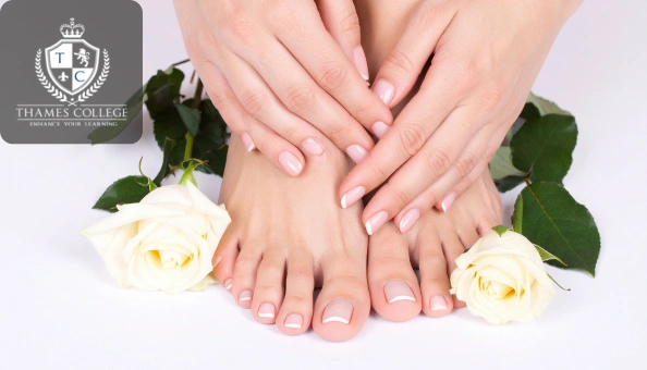 Hands and feet with fresh manicure and pedicure surrounded by white roses for a beauty treatment look.